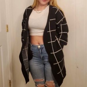 Black and white knee length cardigan, very soft.